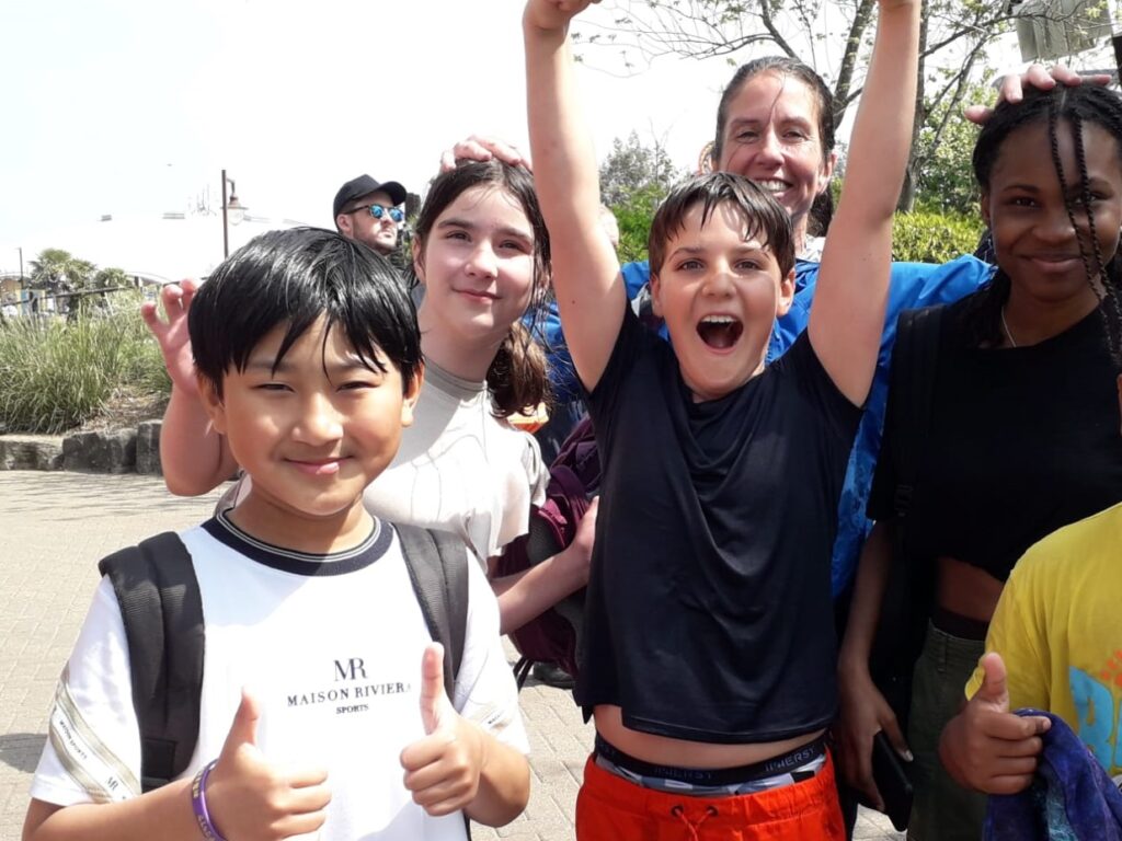 Children cheering at Thorpe Park