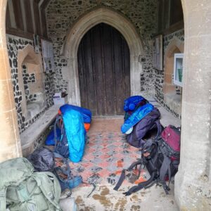 Bronze DofE Expedition backpacks at church doorway