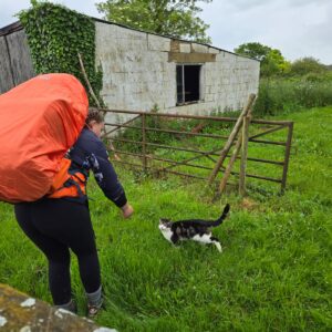 Bronze DofE Expedition girl with backpack and cat