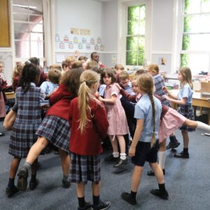 Children dancing in their classroom