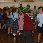 Children dancing in school hall