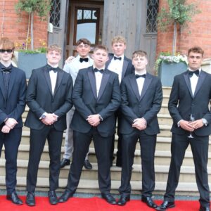 Group of boy students in black tie