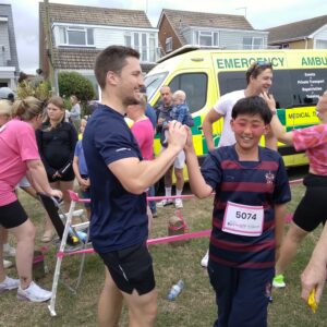 High five at Race for Life run