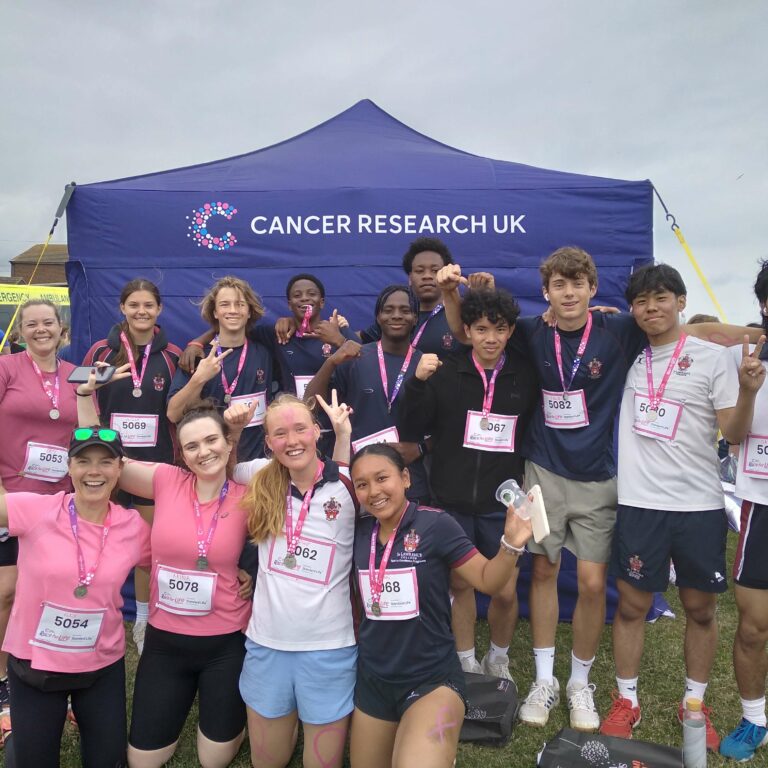 Staff and students run Race for Life in Herne Bay with medals