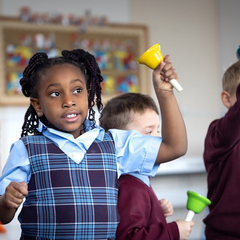 students ringing bells