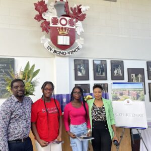 Family smiling at school