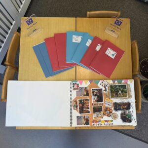 table with children's workbooks