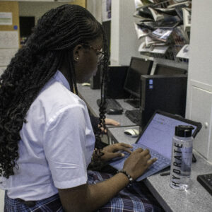 female student working on laptop